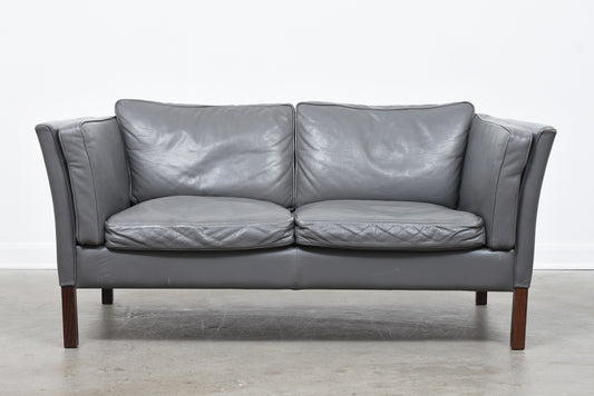 Grey leather two seater by Stouby