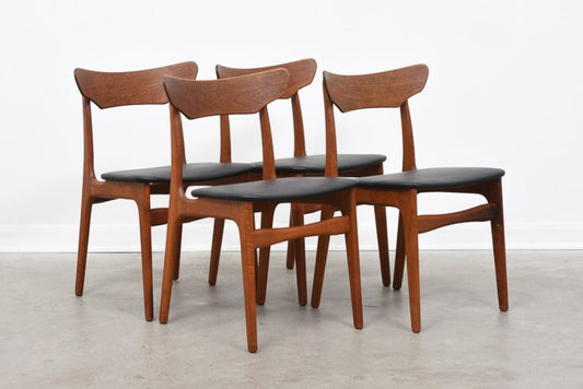 Set of four teak dining chairs