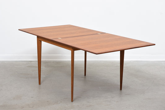 Extending teak table by Karl Erik Ekselius