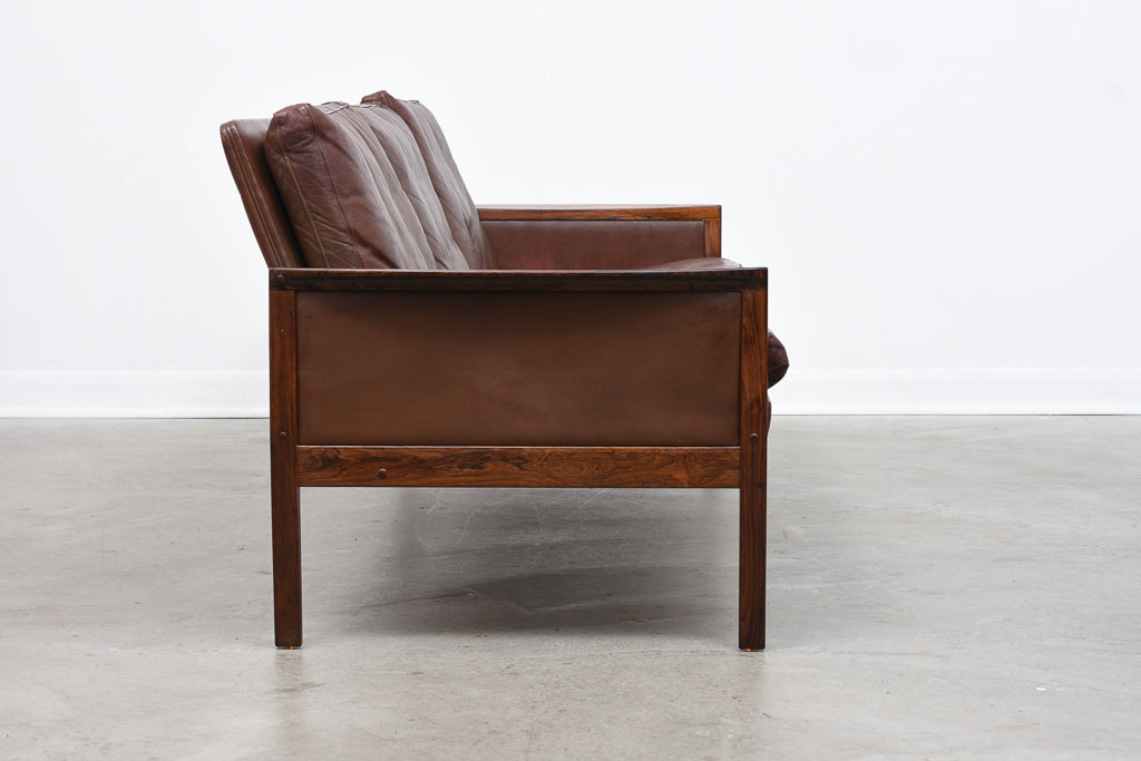 Three seat leather + rosewood sofa by Hans Olsen