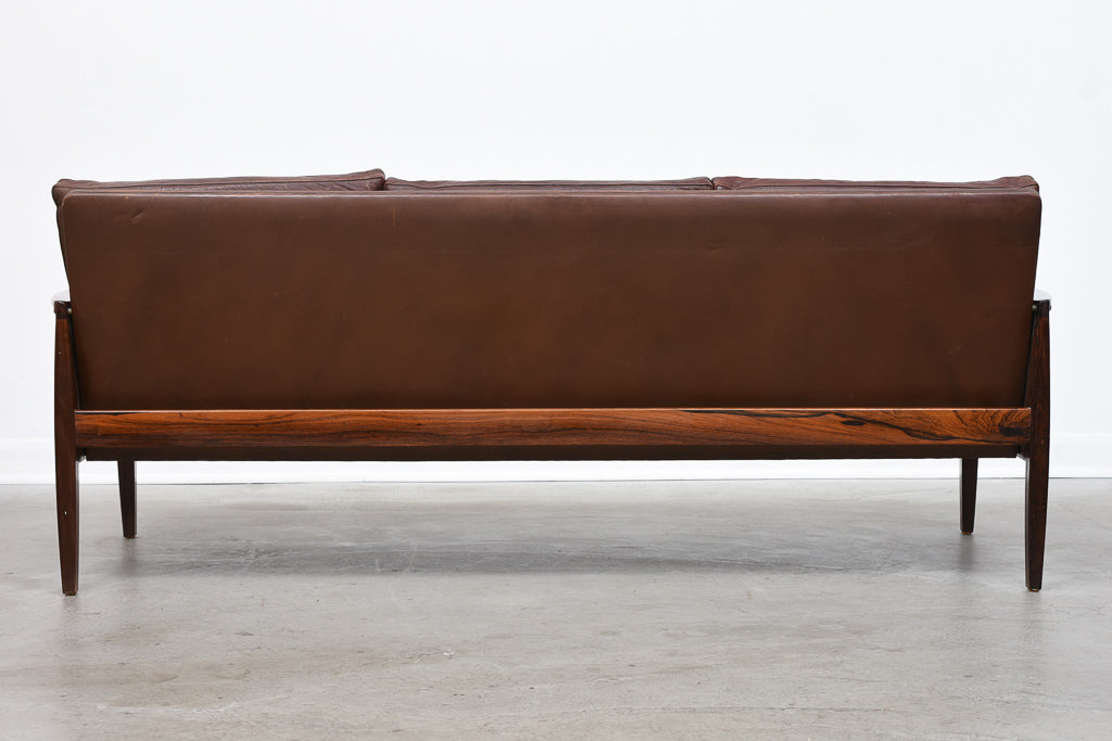Three seat leather + rosewood sofa by Hans Olsen