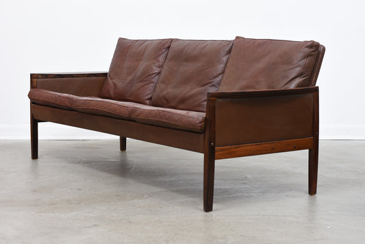 Three seat leather + rosewood sofa by Hans Olsen