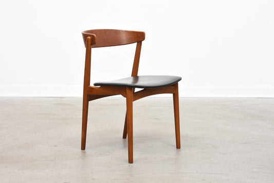 Teak chair with curved back