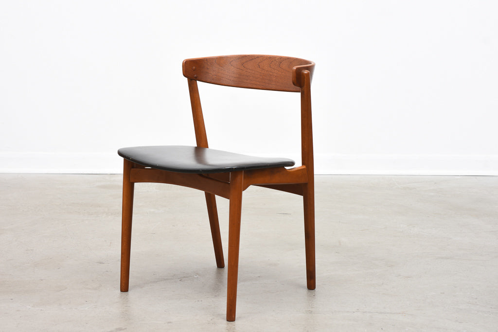 Teak chair with curved back