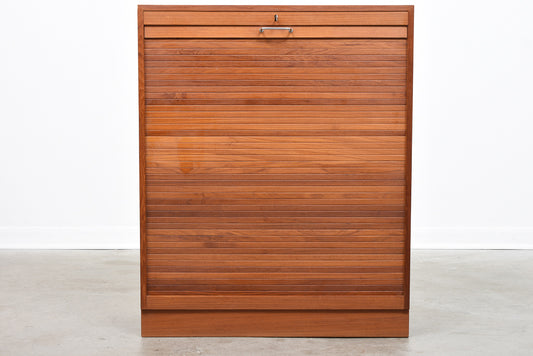 Teak storage unit with tambour door