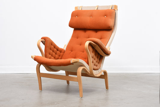 Pernilla lounge chair + foot stool by Bruno Mathsson