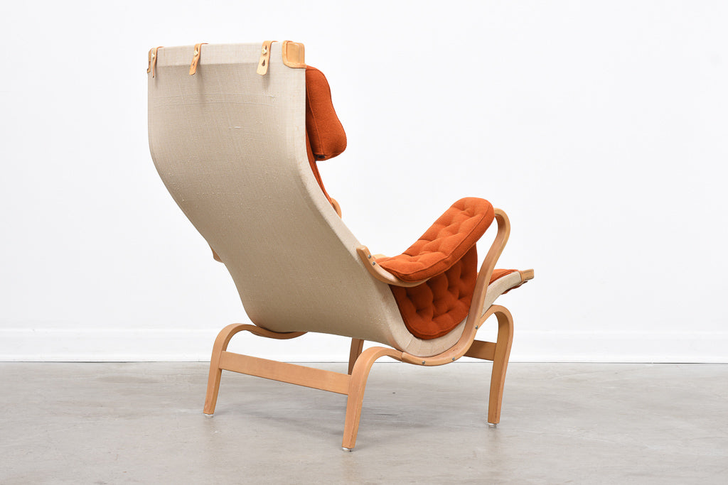 Pernilla lounge chair + foot stool by Bruno Mathsson