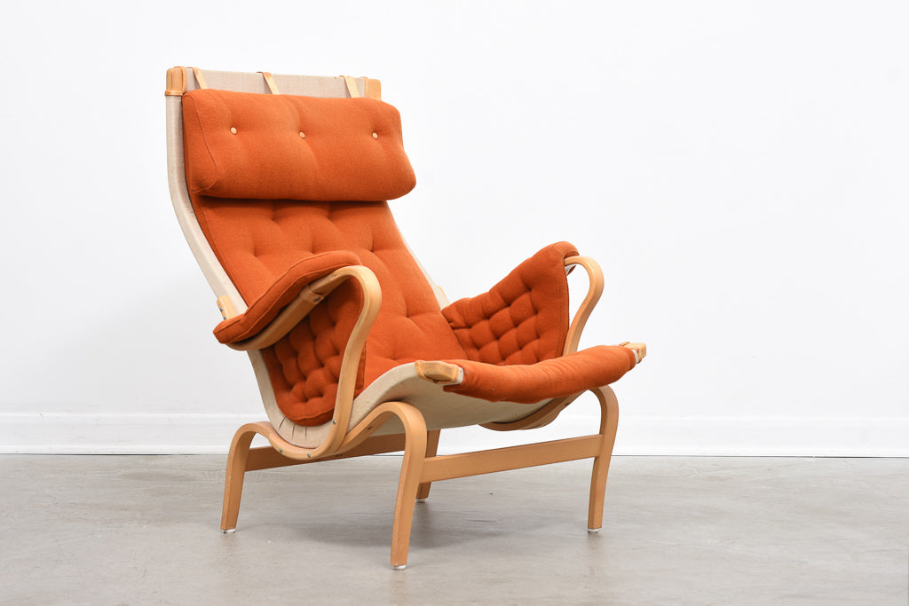 Pernilla lounge chair + foot stool by Bruno Mathsson