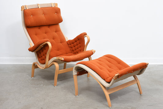 Pernilla lounge chair + foot stool by Bruno Mathsson