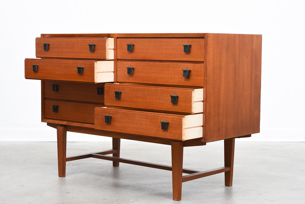 Low chest of eight drawers in teak