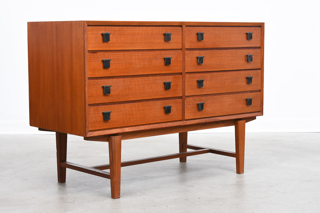 Low chest of eight drawers in teak