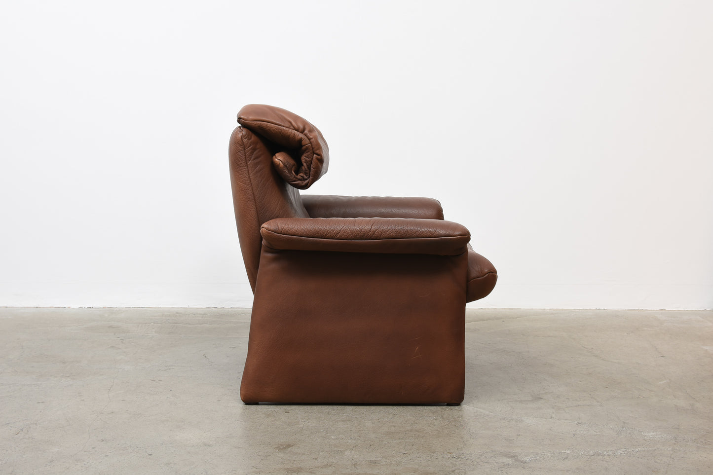 1980s reclining leather lounger + ottoman