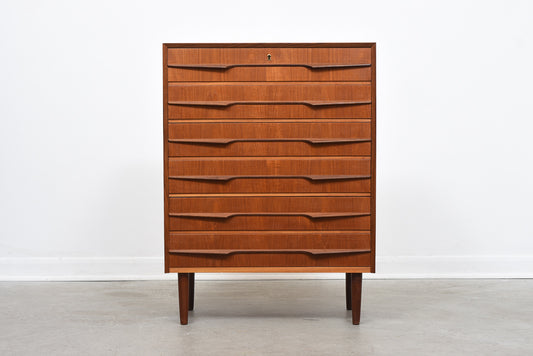 Teak chest of drawers with sculpted handles