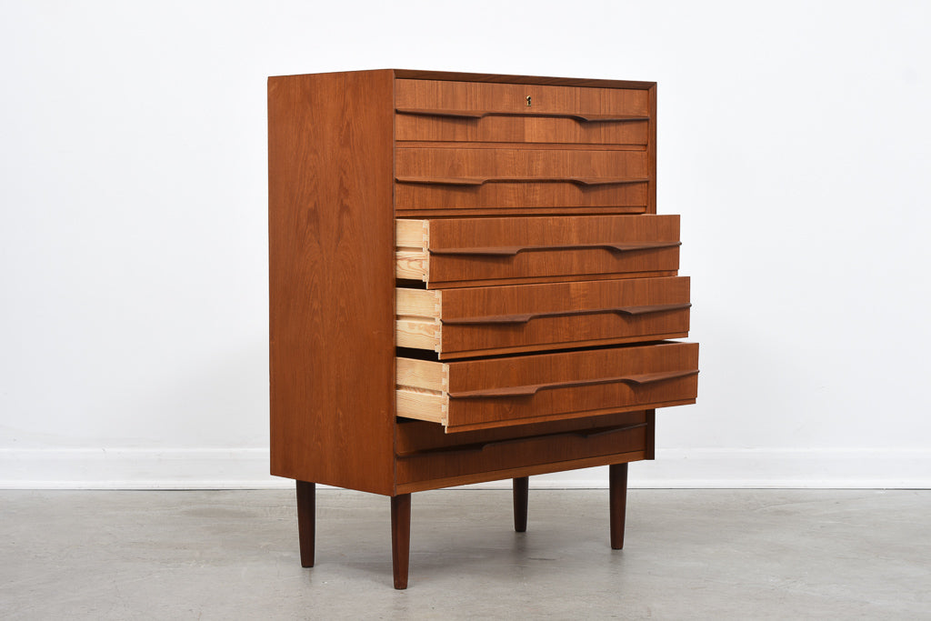 Teak chest of drawers with sculpted handles
