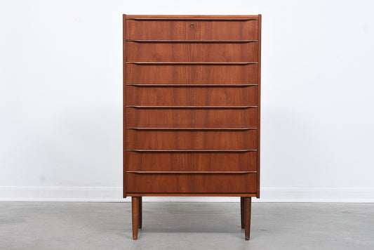 Tall teak chest of eight drawers