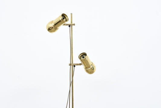 Vintage twin-headed brass floor lamp