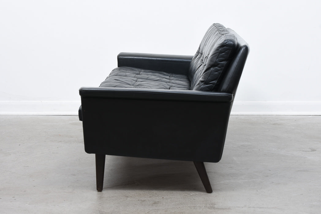 Vintage three seat sofa in black leather