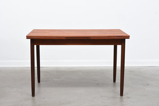 Extending Danish dining table in teak