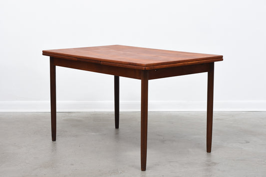 Extending Danish dining table in teak