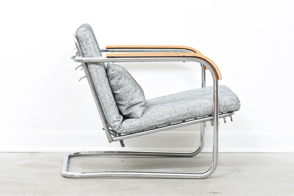 One left: Reclining steel lounge chair