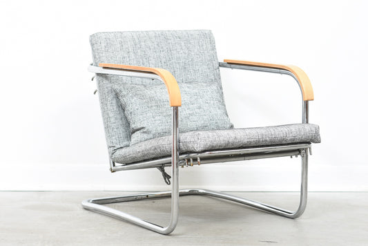 One left: Reclining steel lounge chair