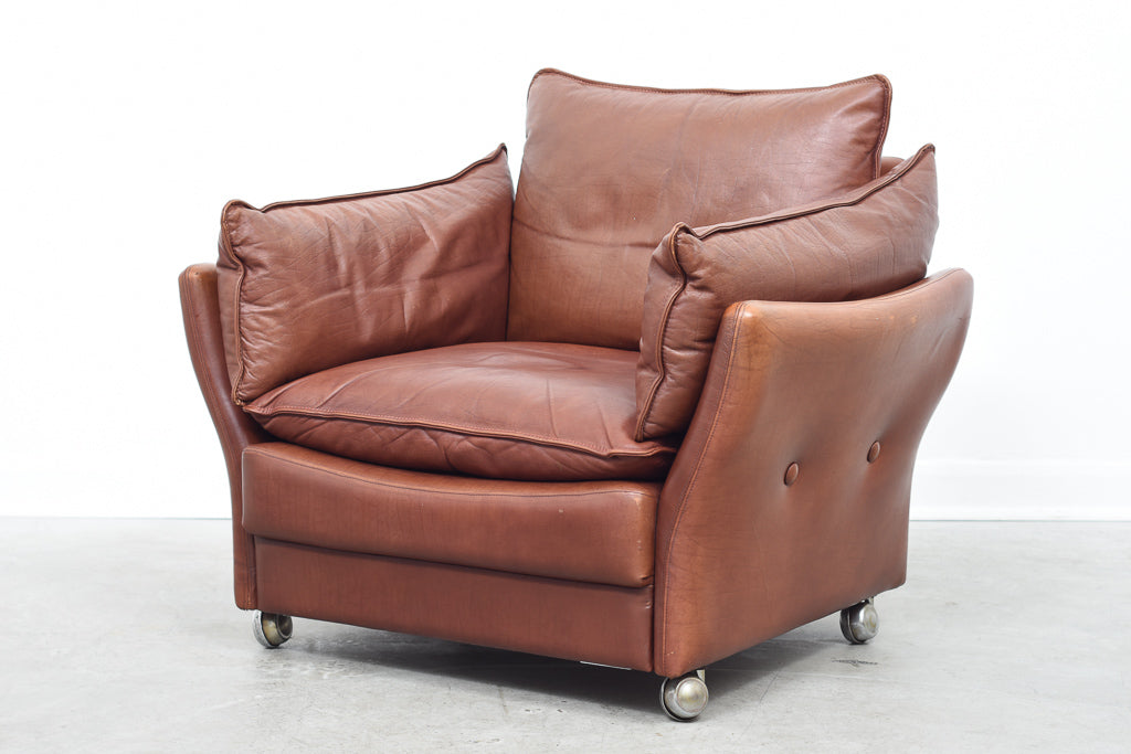 1970s leather lounger on wheels