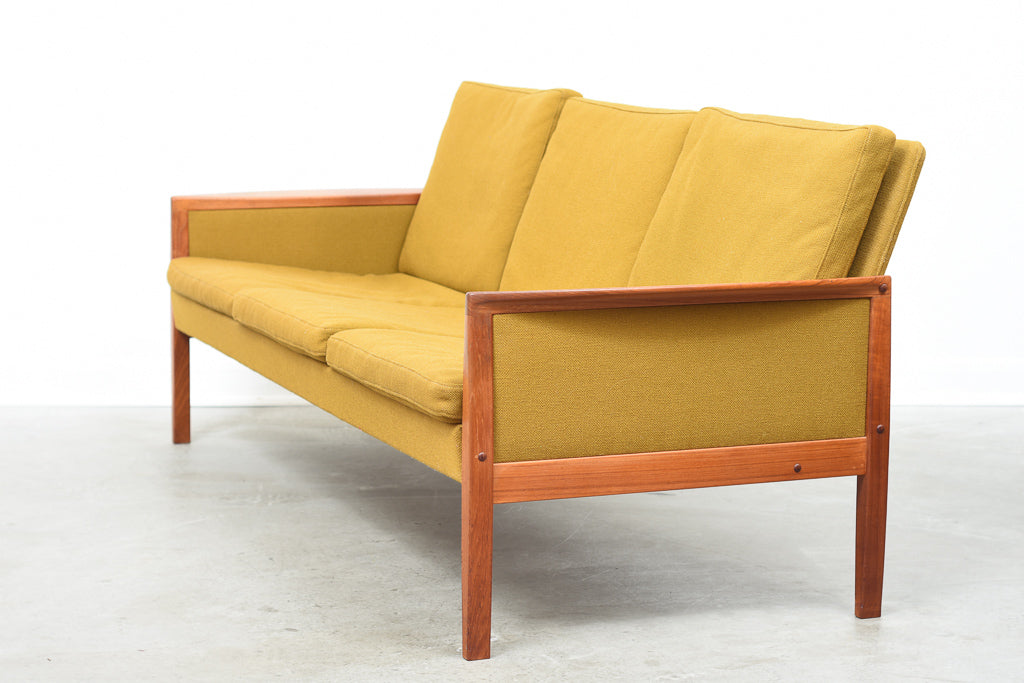 1960s teak-framed three seat sofa