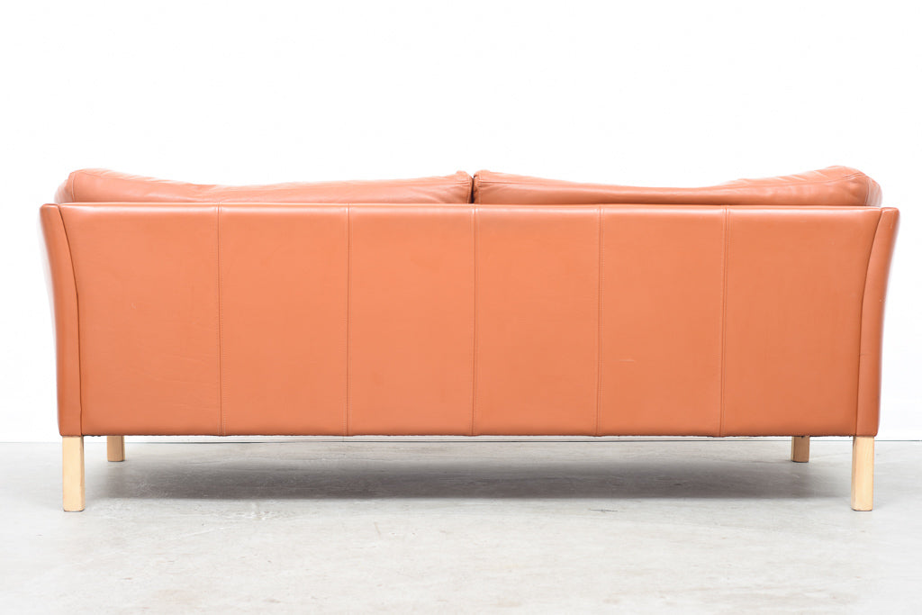 Two and a half seat leather sofa by Mogens Hansen