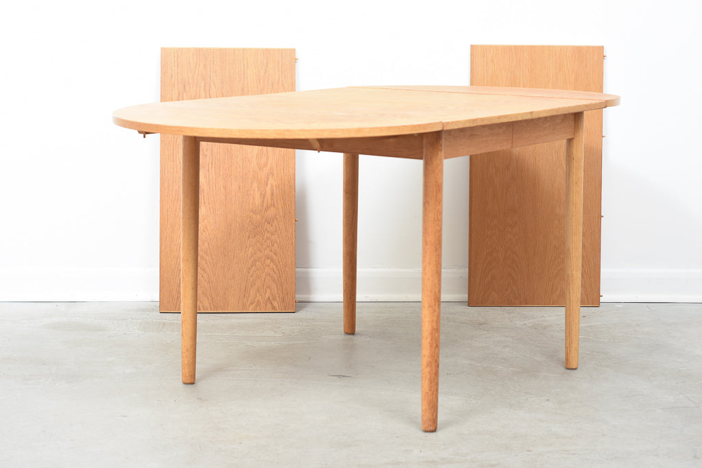 Square extending dining table in oak