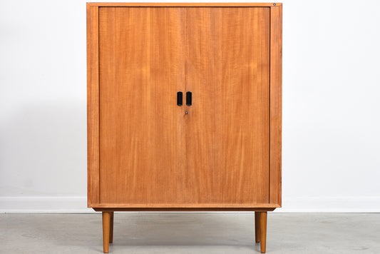 Storage cabinet in teak with tambour door