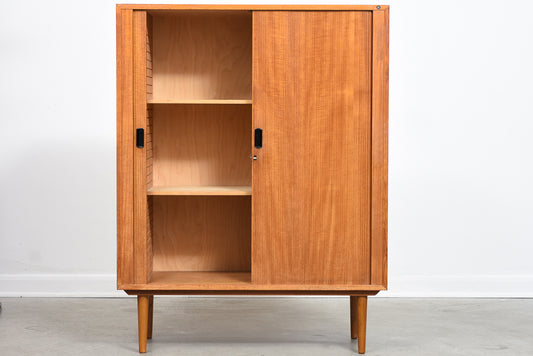 Storage cabinet in teak with tambour door