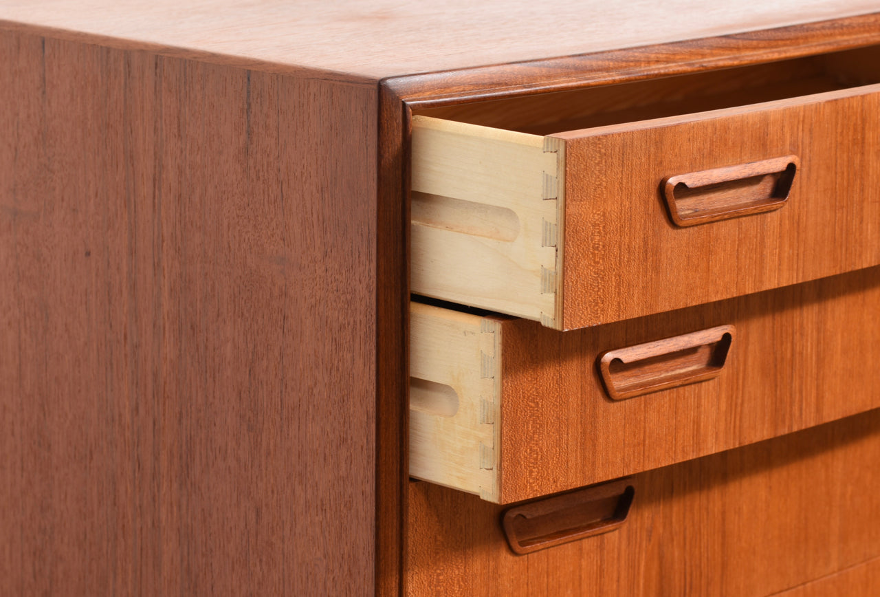 Bow-fronted chest of seven teak drawers
