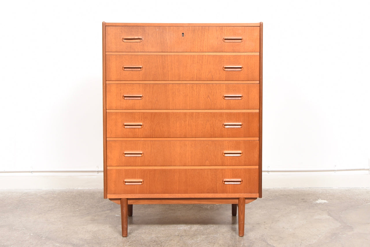 Teak chest of six drawers with inset handles