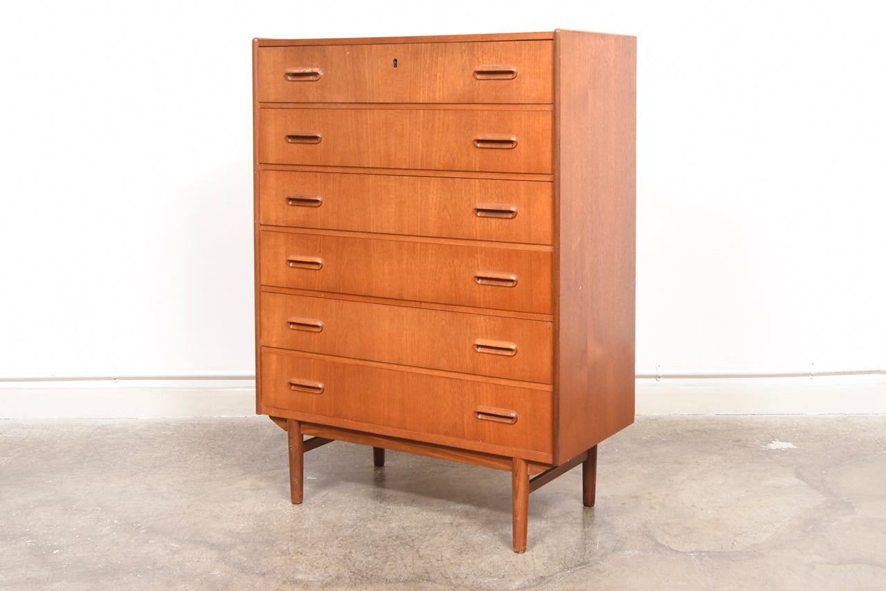 Teak chest of six drawers with inset handles