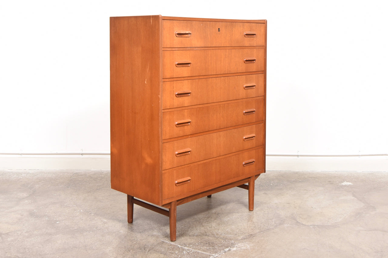 Teak chest of six drawers with inset handles