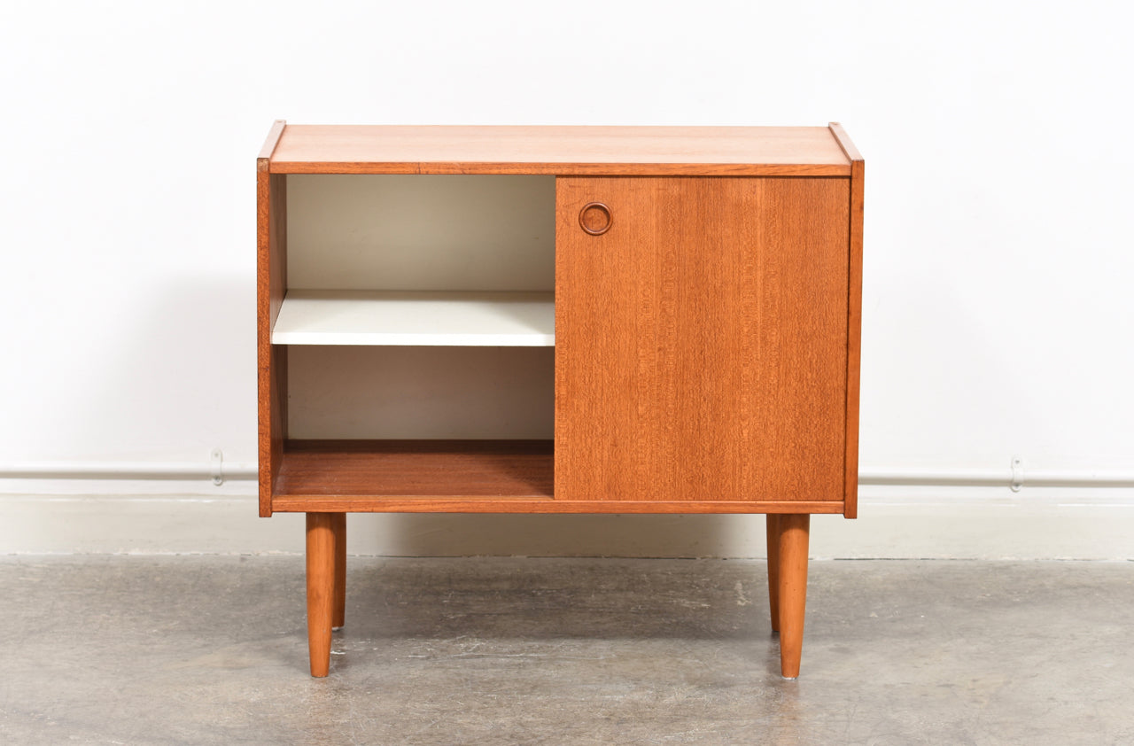 Short teak storage cabinet