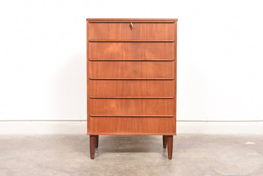 Chest of six teak drawers with lipped handles