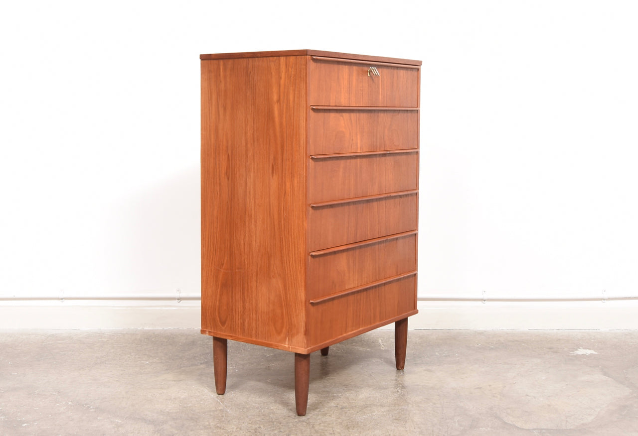 Chest of six teak drawers with lipped handles