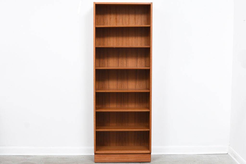 Two available: Tall teak bookshelves by Poul Hundevad