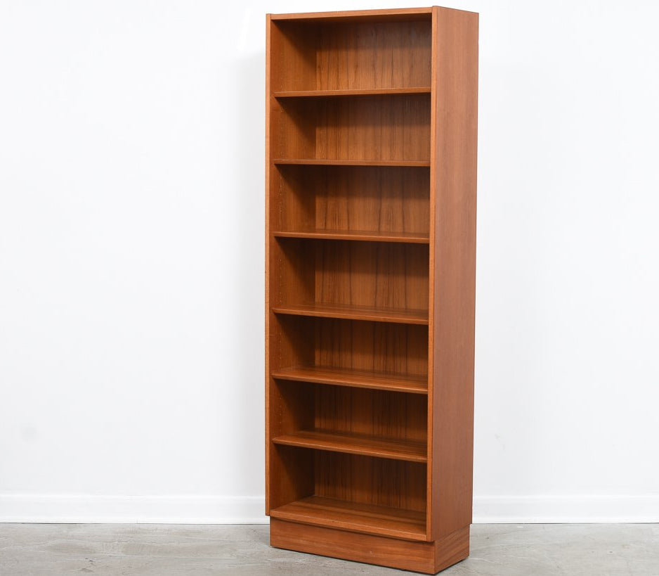 Two available: Tall teak bookshelves by Poul Hundevad