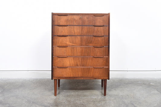 Chest of six drawers in rosewood with lipped handles