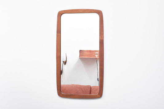 Mirror with brass details