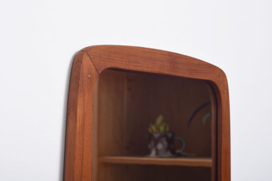 Mirror with brass details