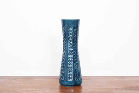 Tall turquoise vase