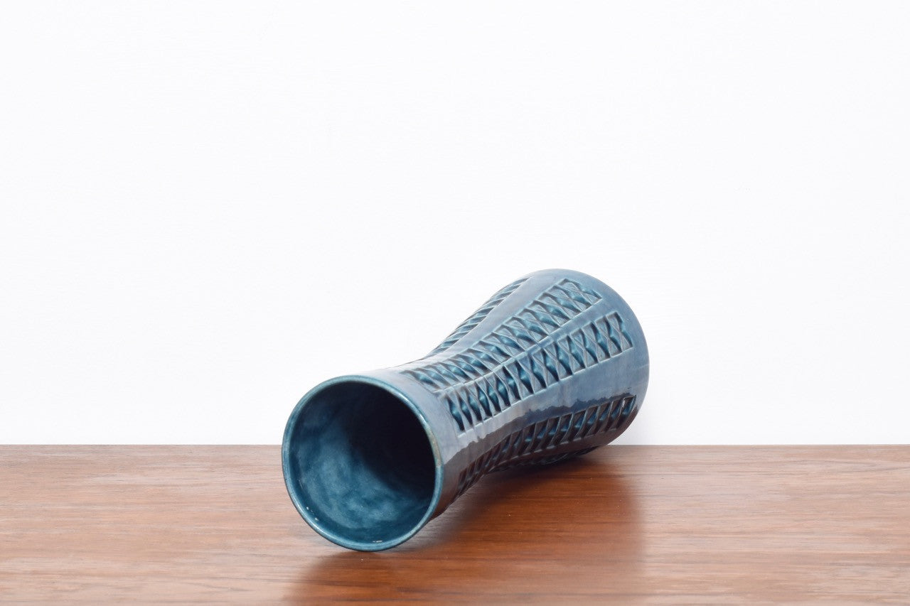 Tall turquoise vase