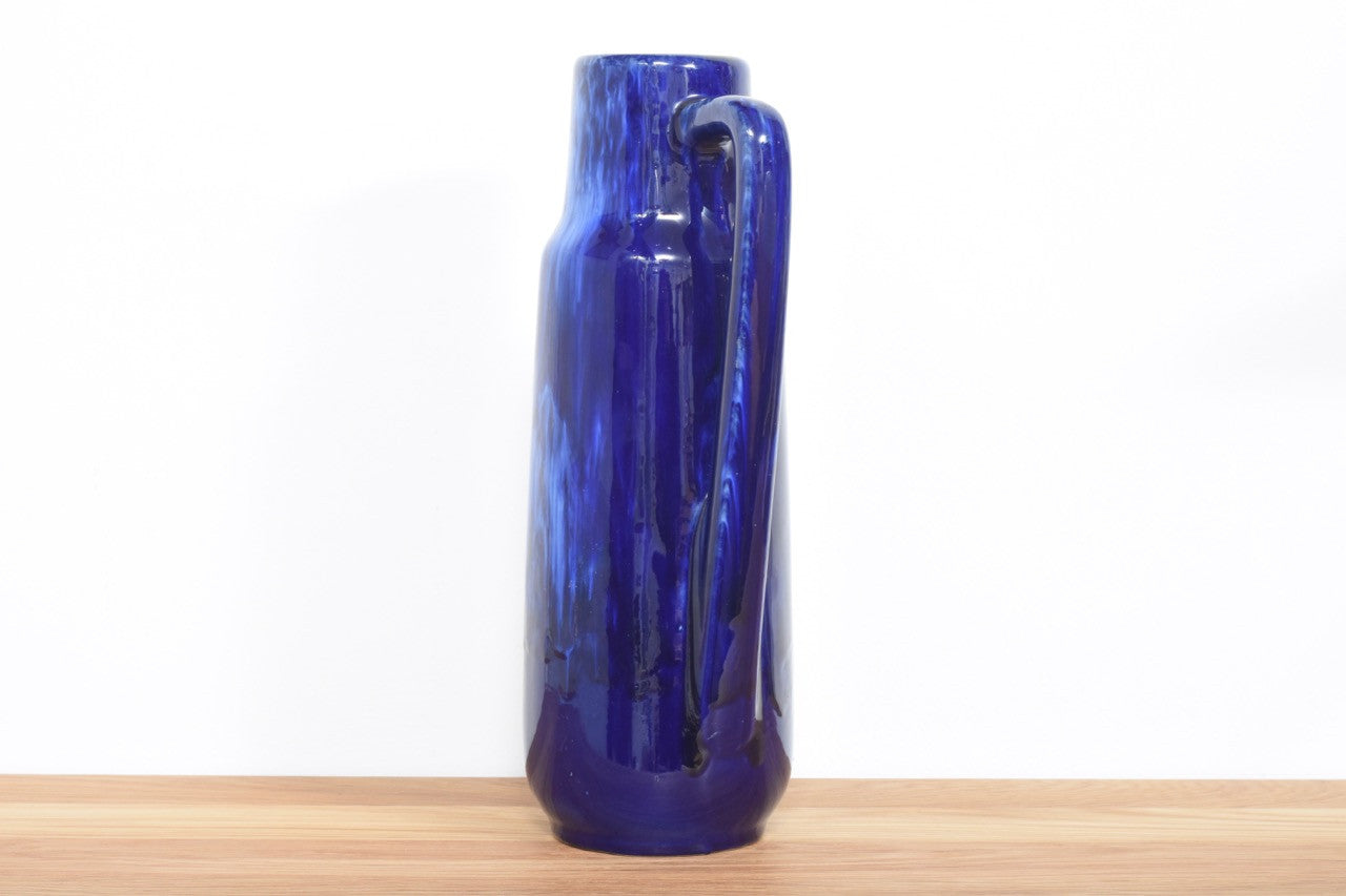 Tall blue pitcher vase