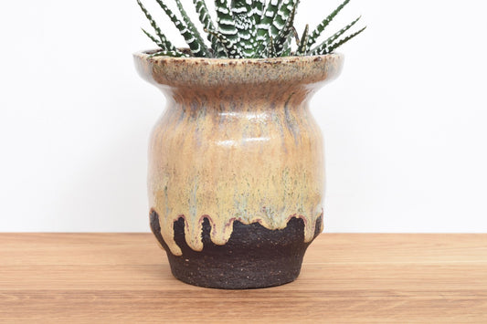 Stoneware planter with running glaze