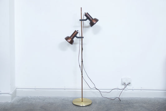 Twin headed copper floor lamp