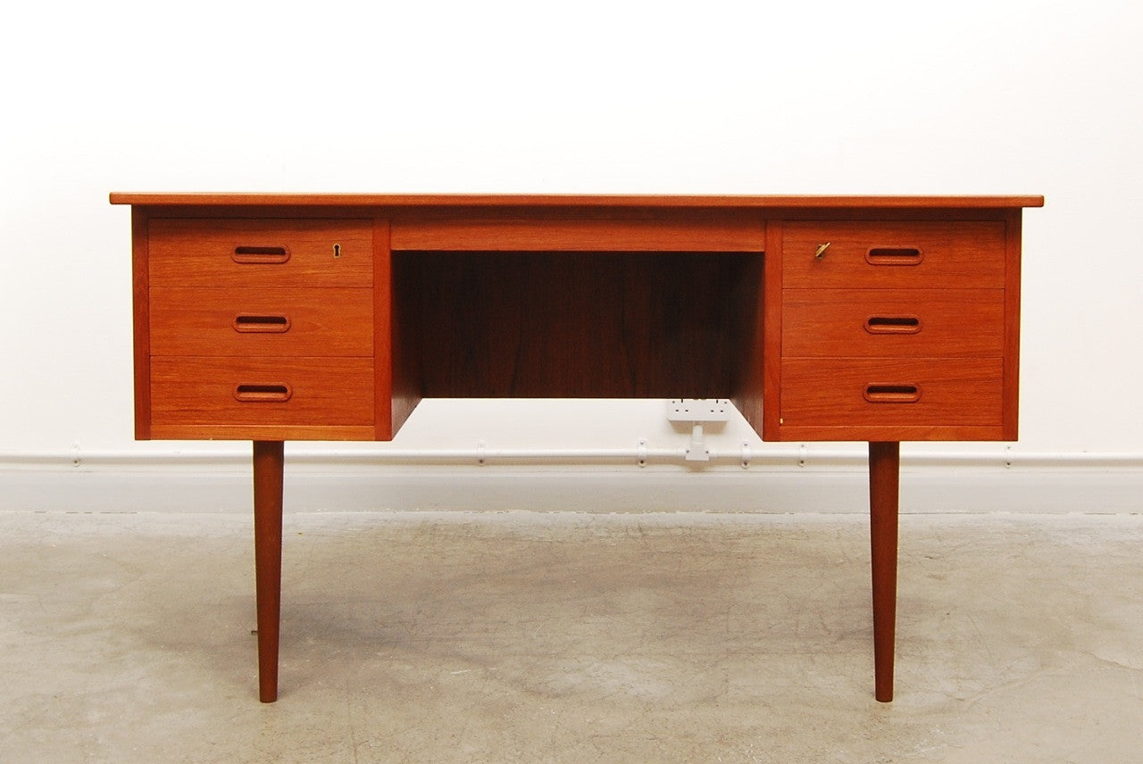 Bow fronted teak desk