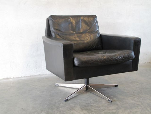 Lowback swivel chair in black leather